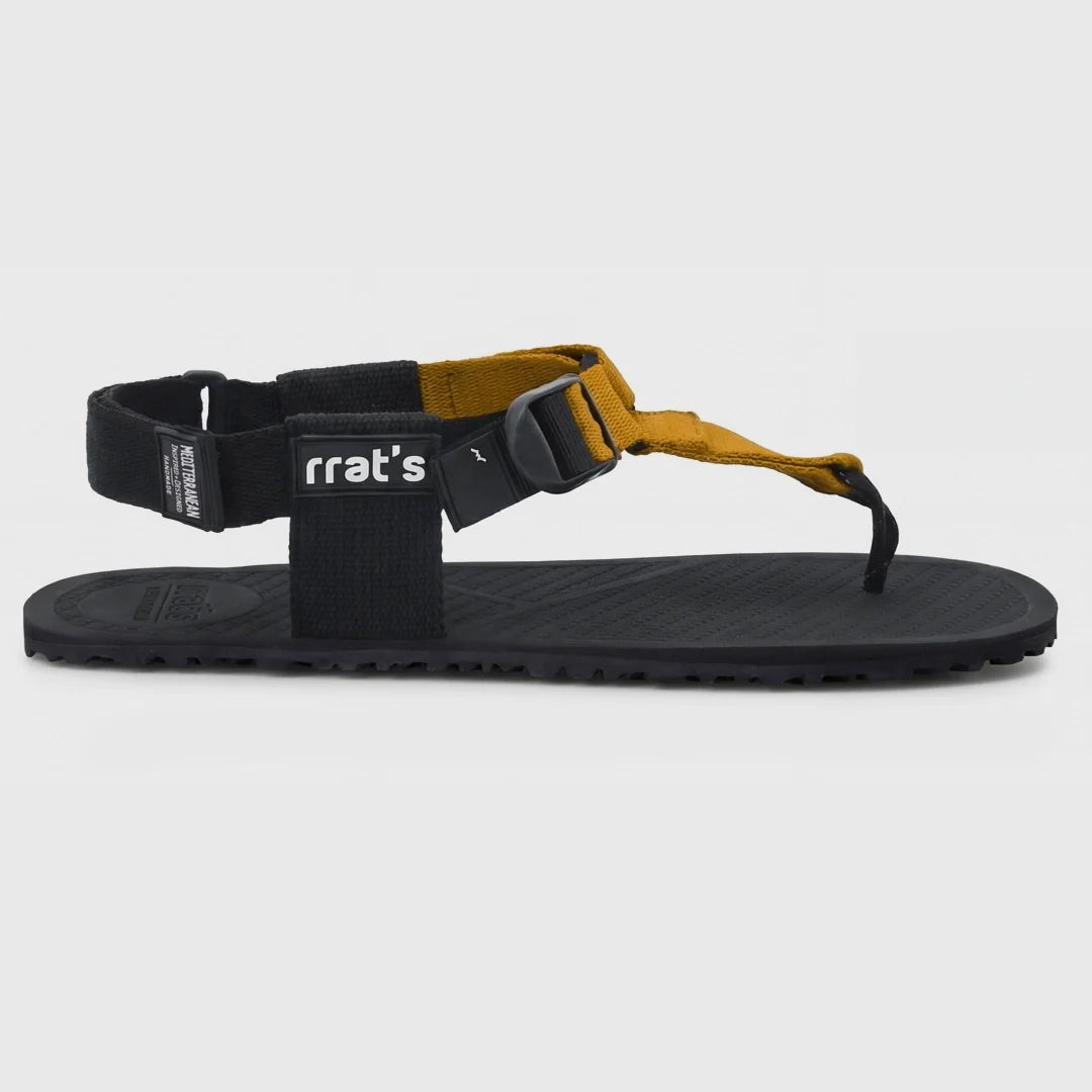 Sandàlies barefoot RRAT’s Y-Minimal mostassa amb sola Vibram flexible i disseny minimalista. Vista lateral.