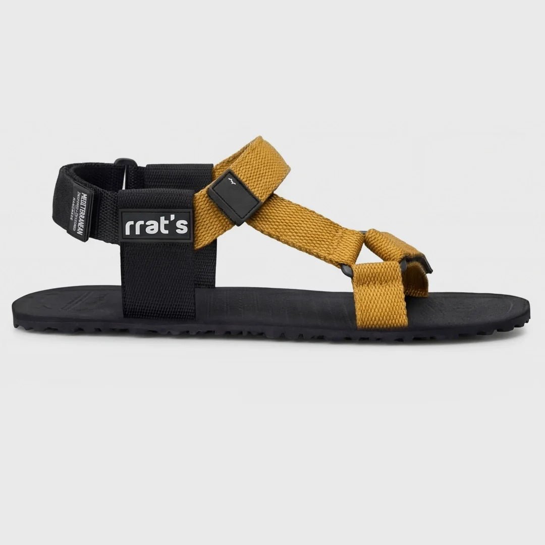 Sandàlies barefoot RRAT’s T-Minimal amb sola Vibram flexible i ajust regulable al peu. Vista lateral.