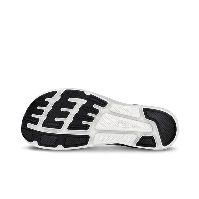 Altra W Escalante 4 negra amb sola blanca, dissenyada per running natural amb Zero Drop i FootShape™.